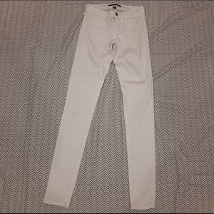 White skinny jeans, comfortable material.